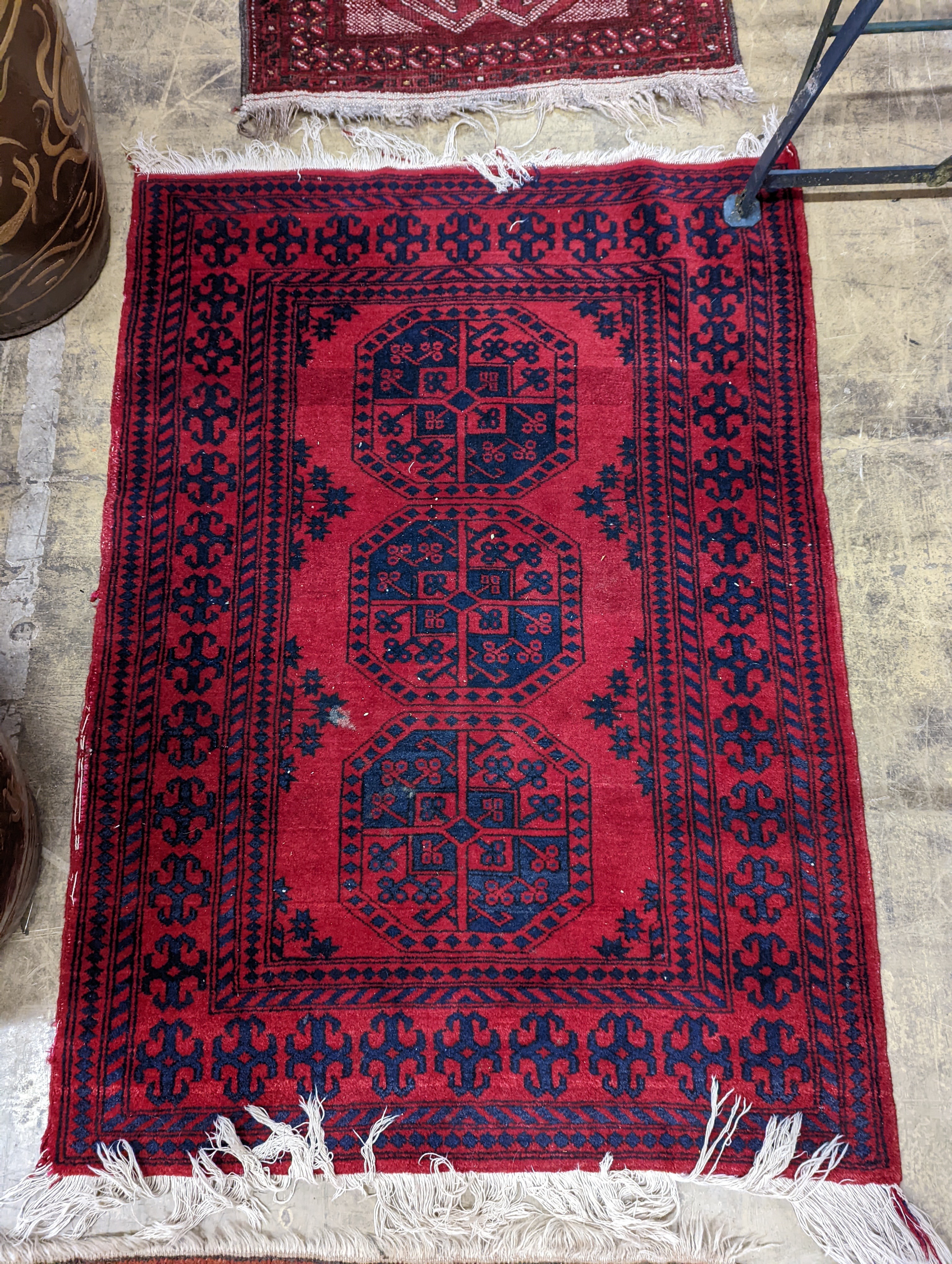 Three Bokhara rugs, largest 134 x 99cm